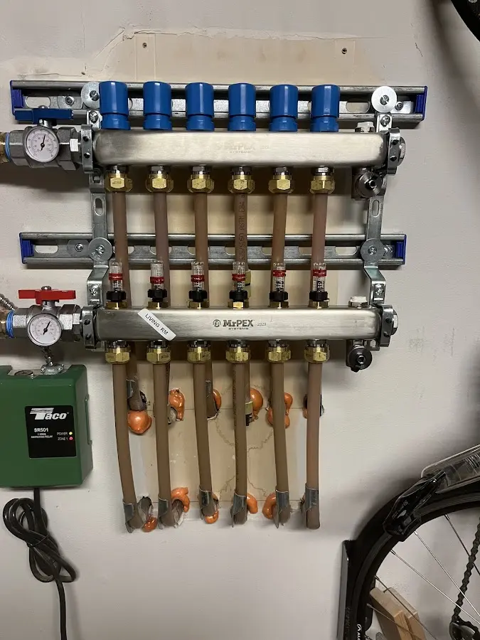 Plumber performing Gas Line Installation at a residential property in Bourne